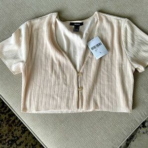 forever 21 cropped top with buttons, has a matching skirt